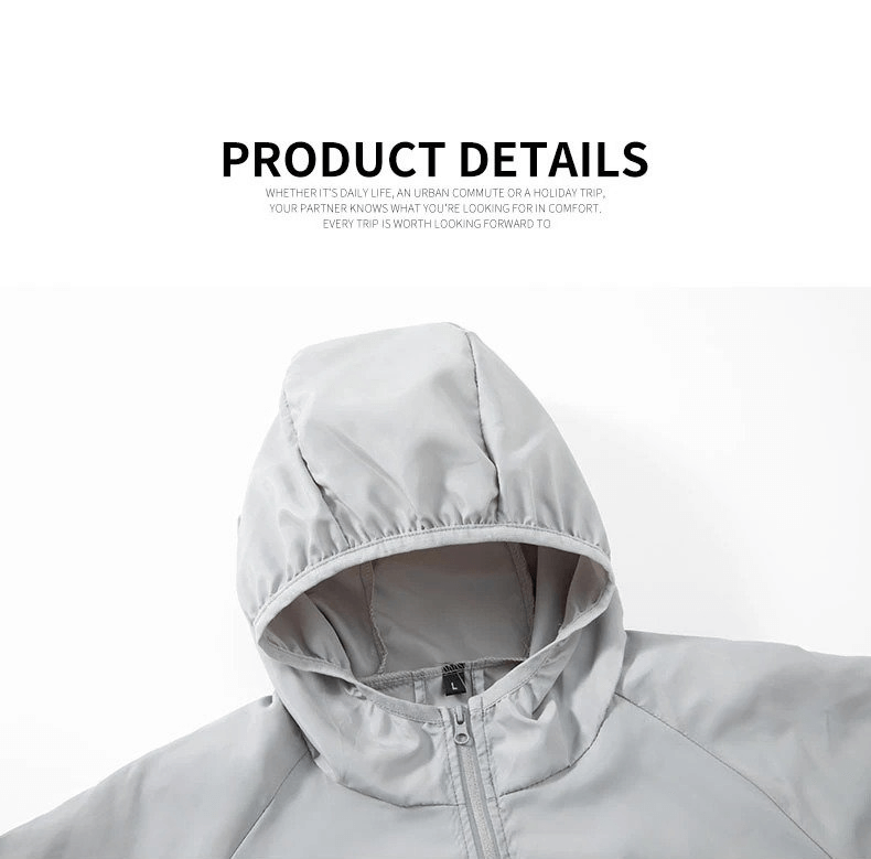 Gray waterproof reflective women's jacket with hood, ideal for sun protection and outdoor activities like camping and hiking.